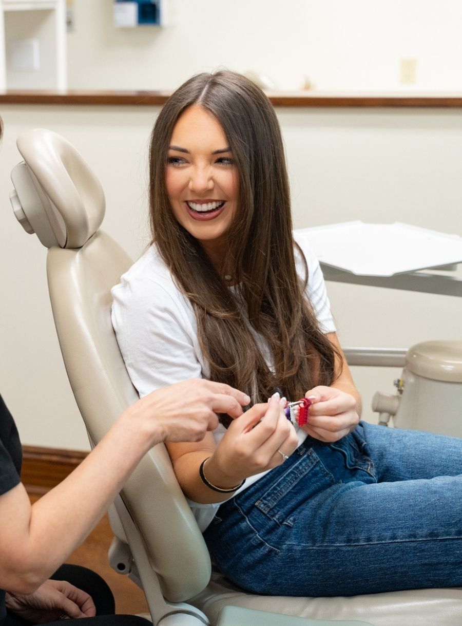 williams orthodontics patient smiling in mirror